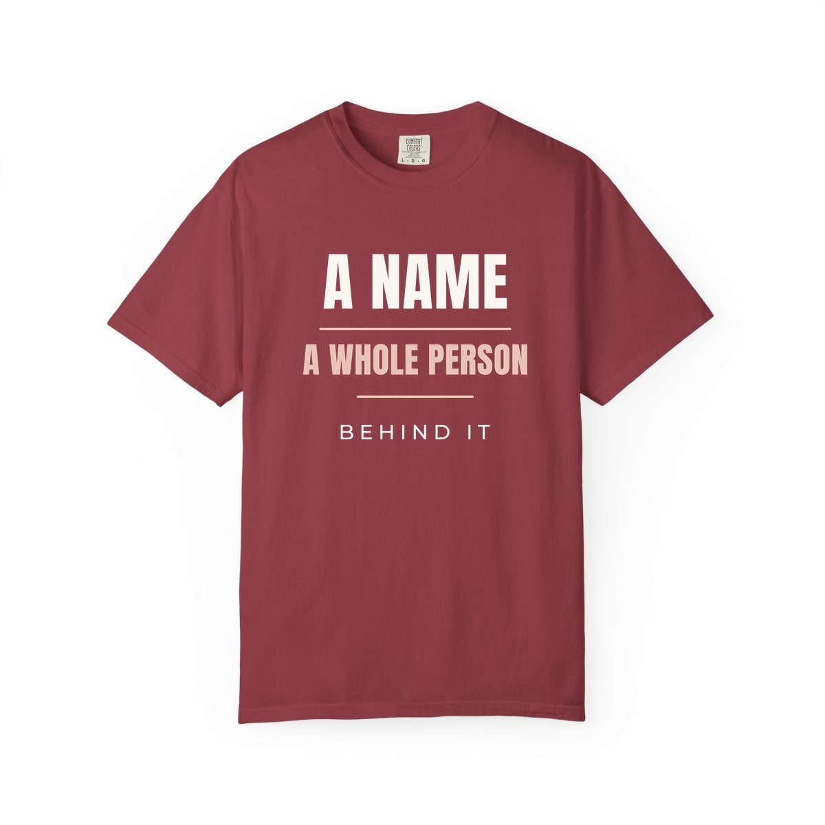 A Whole Person Behind It, printed on a Comfort Colors garment-dyed t-shirt in Chili