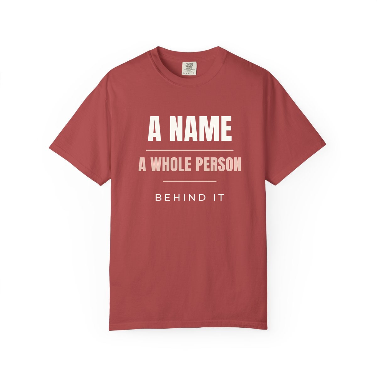 A Whole Person Behind It, printed on a Comfort Colors garment-dyed t-shirt in Crimson
