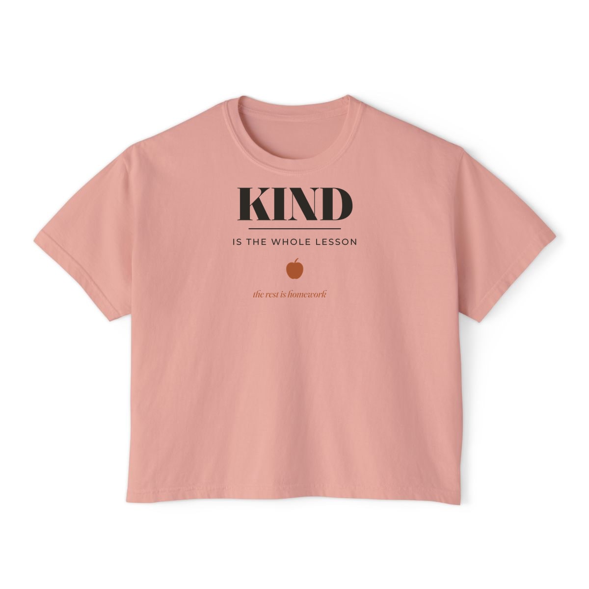 Kind Is The Whole Lesson, printed on a boxy tee in Peachy