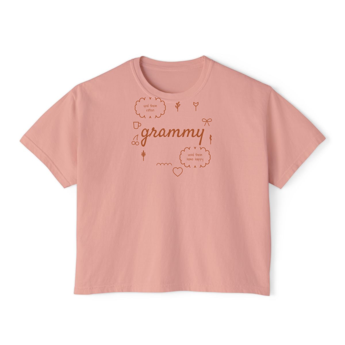 Spoil Them, Send Them Home, printed on a boxy tee in Peachy