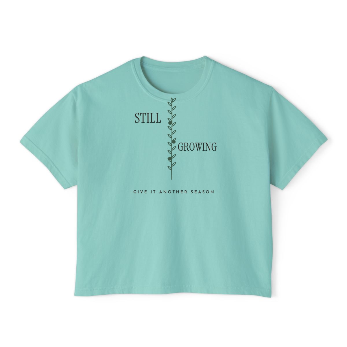 Still Growing Olive Branch, printed on a boxy tee in Chalky Mint
