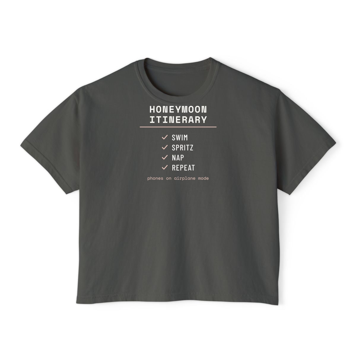 The Honeymoon Itinerary, printed on a boxy tee in Pepper