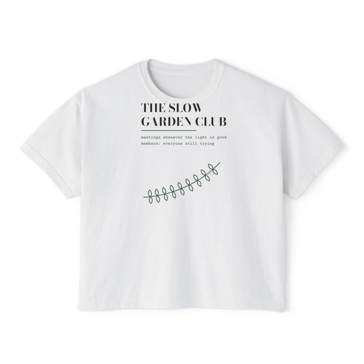 The Slow Garden Club, printed on a boxy tee in White