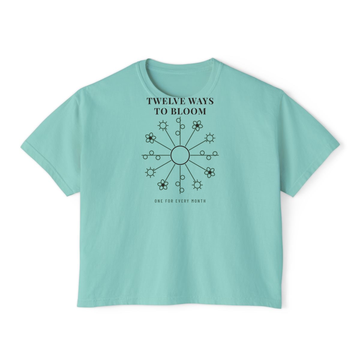 Twelve Ways To Bloom, printed on a boxy tee in Chalky Mint