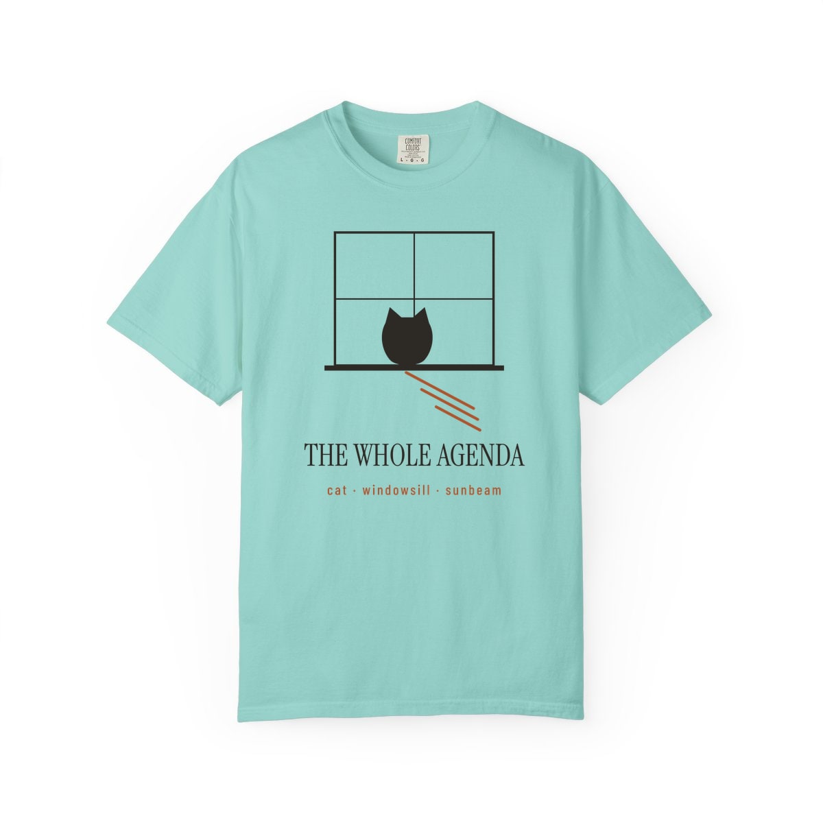 Cat, Windowsill, Sunbeam, printed on a Comfort Colors garment-dyed t-shirt in Chalky Mint