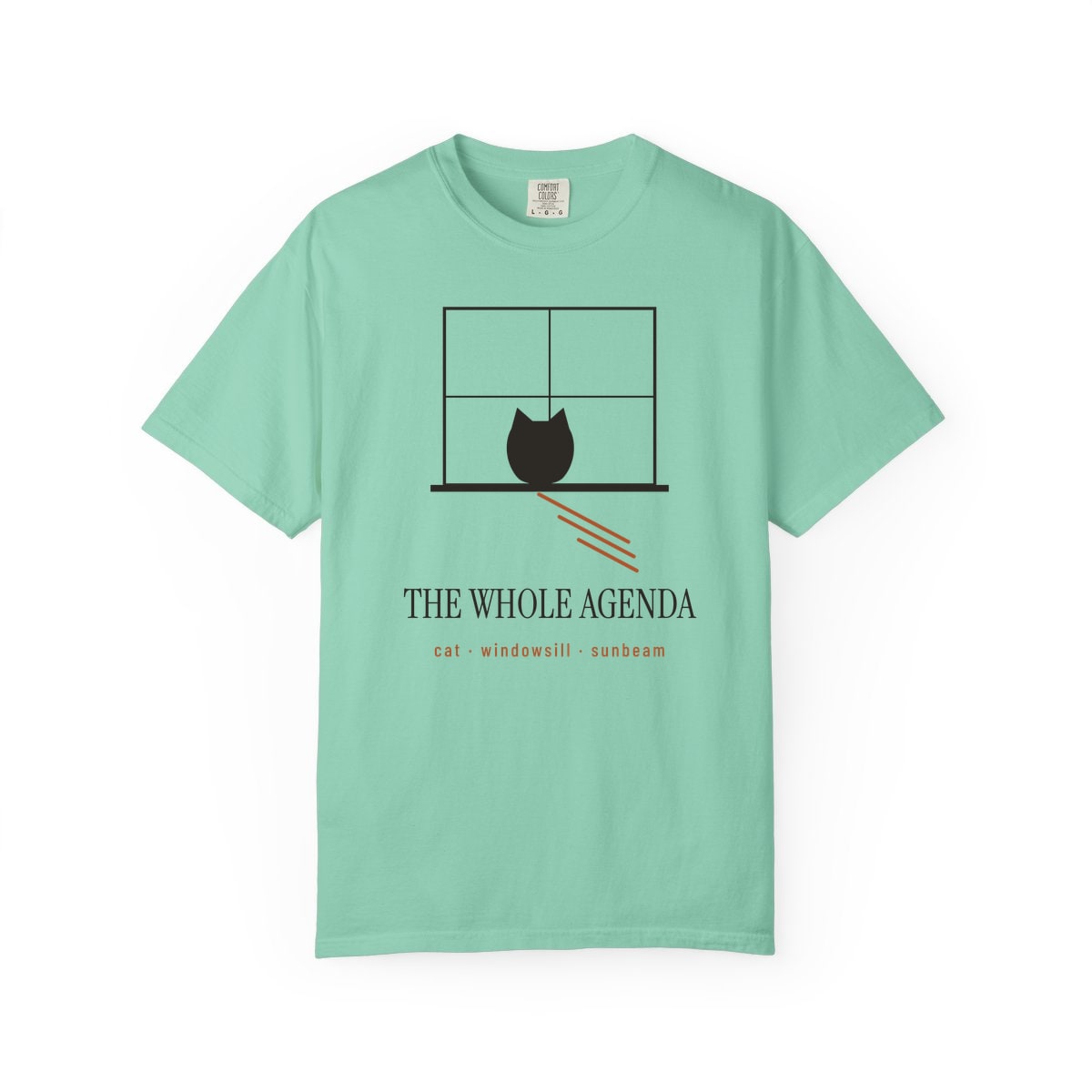 Cat, Windowsill, Sunbeam, printed on a Comfort Colors garment-dyed t-shirt in Island Reef