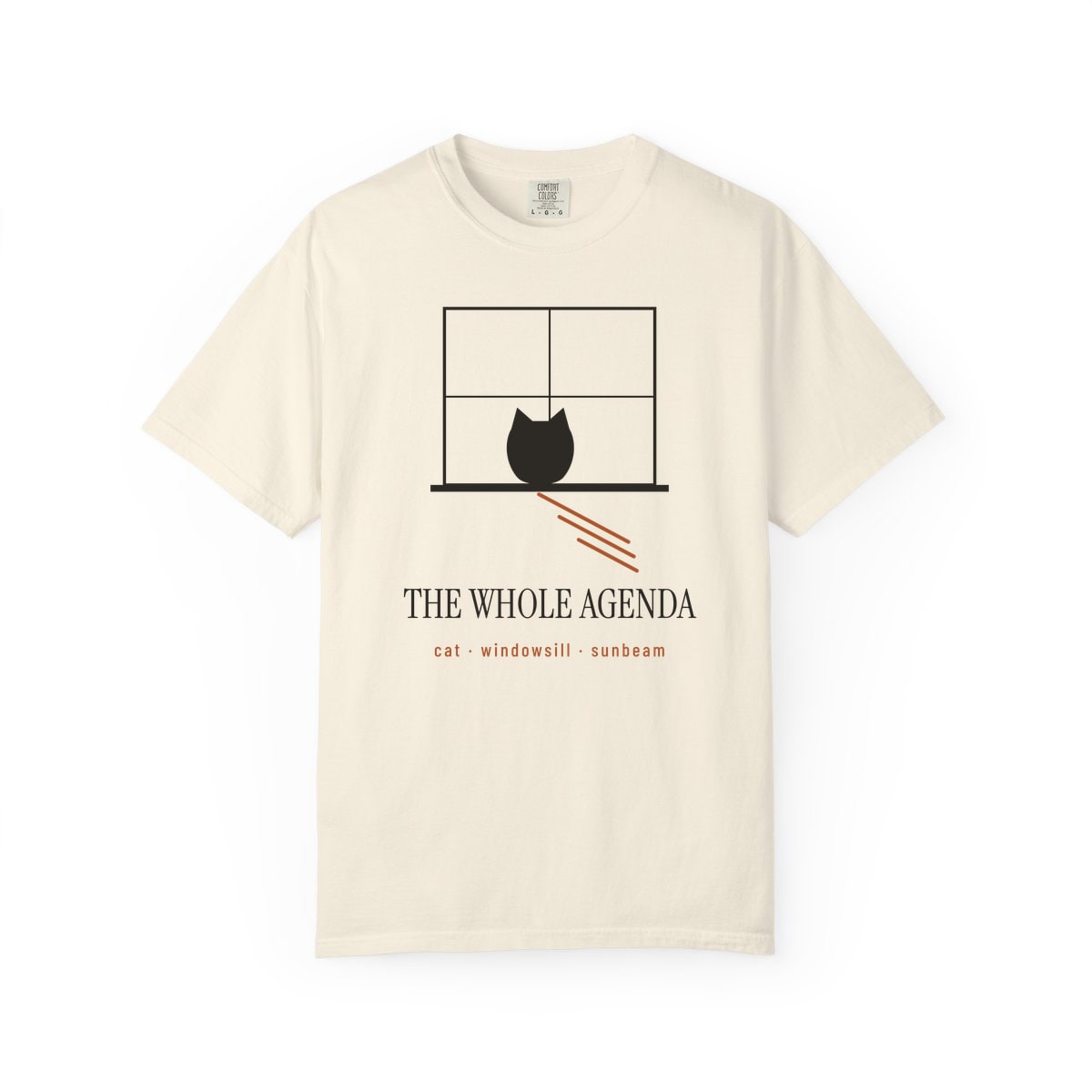 Cat, Windowsill, Sunbeam, printed on a Comfort Colors garment-dyed t-shirt in Ivory