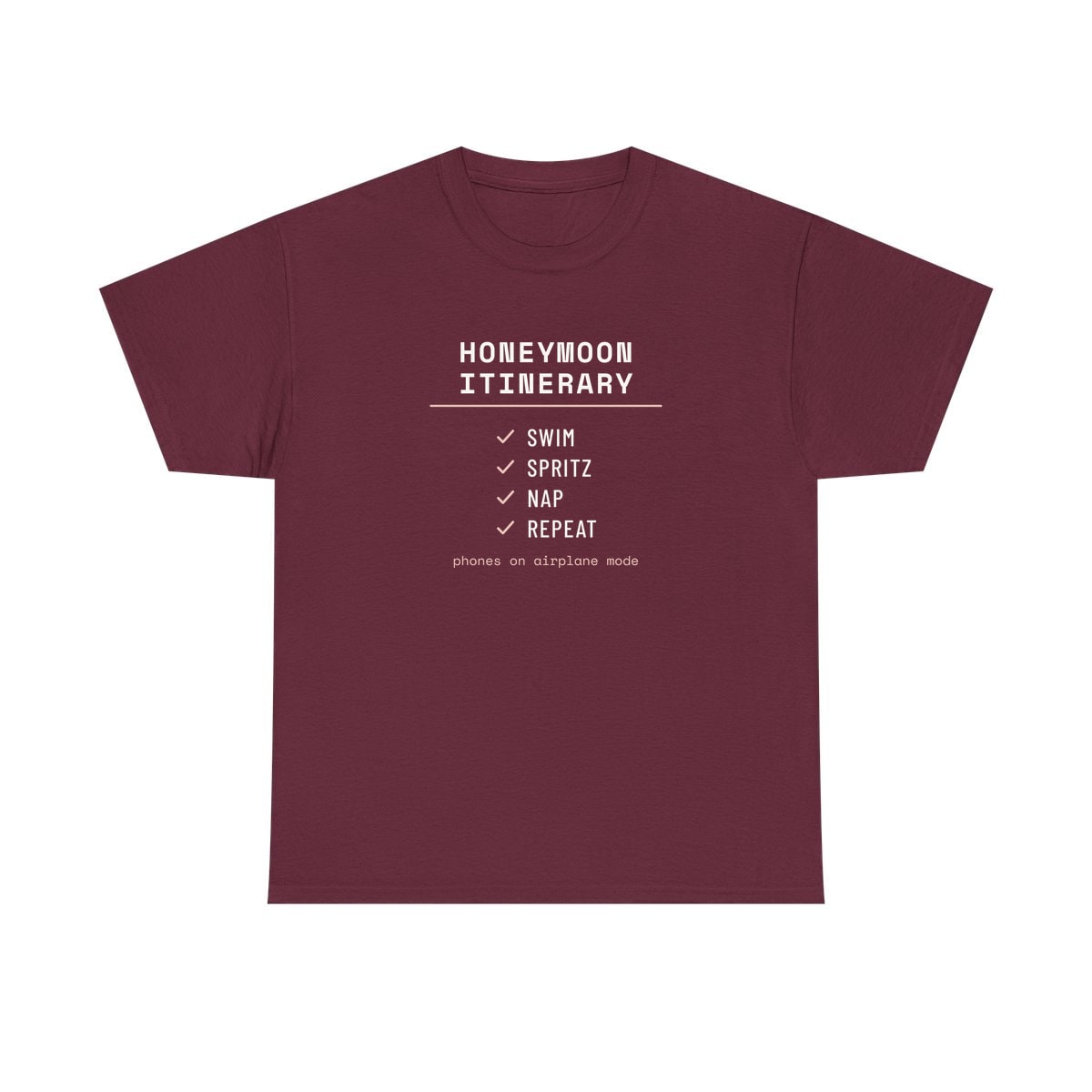 The Honeymoon Itinerary, printed on a heavy cotton tee in Maroon