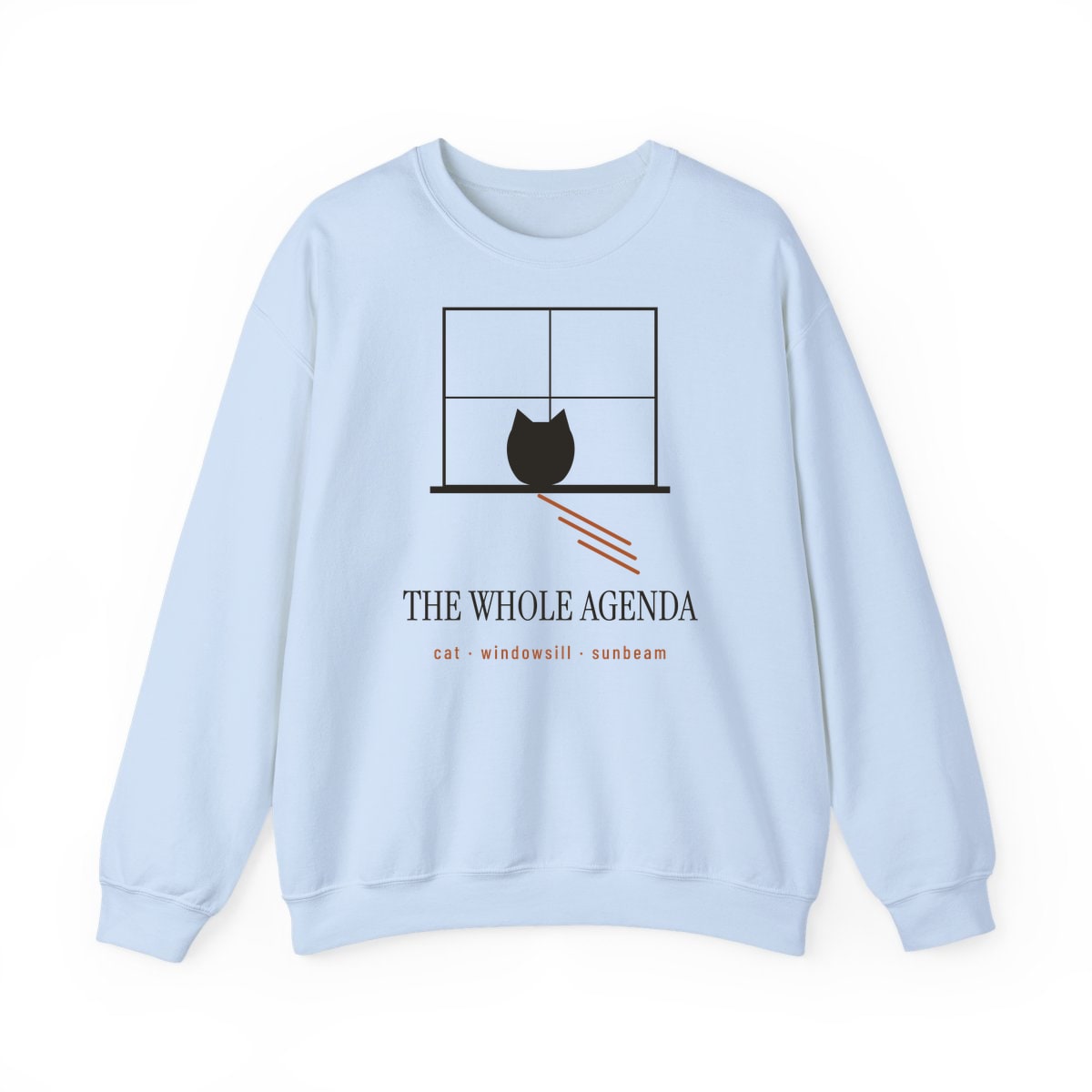 Cat, Windowsill, Sunbeam, printed on a crewneck in Light Blue