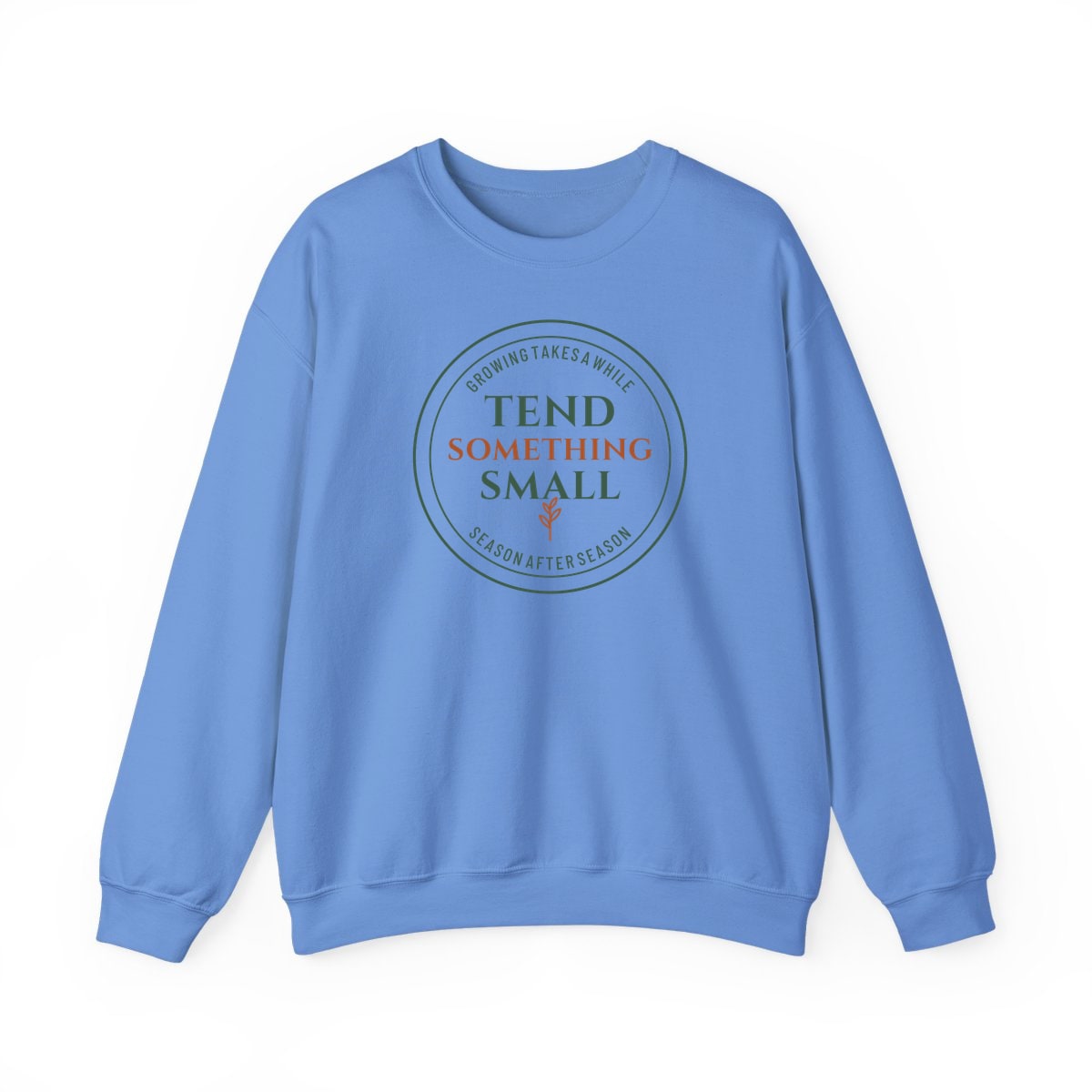 Tend Something Small, printed on a crewneck in Carolina Blue