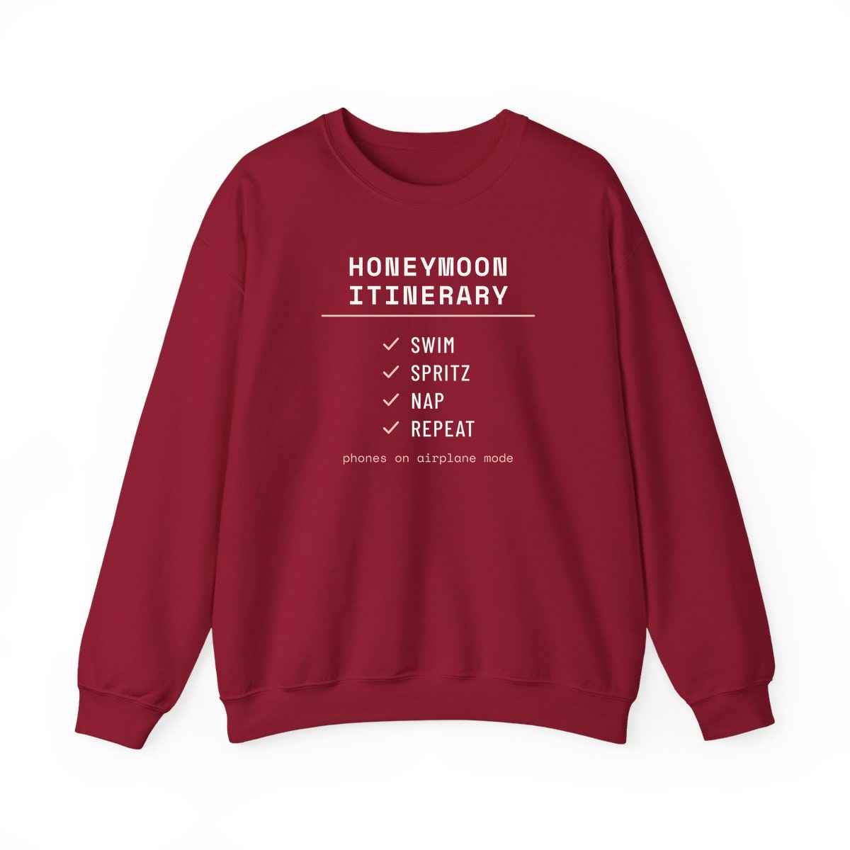 The Honeymoon Itinerary, printed on a crewneck in Cardinal Red