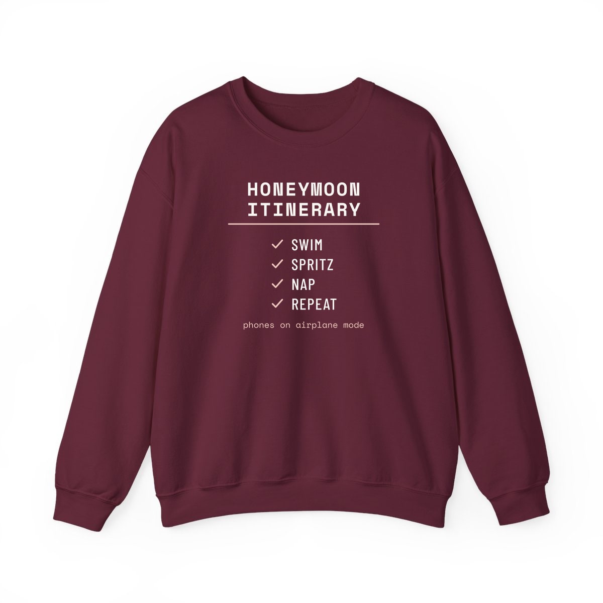 The Honeymoon Itinerary, printed on a crewneck in Maroon