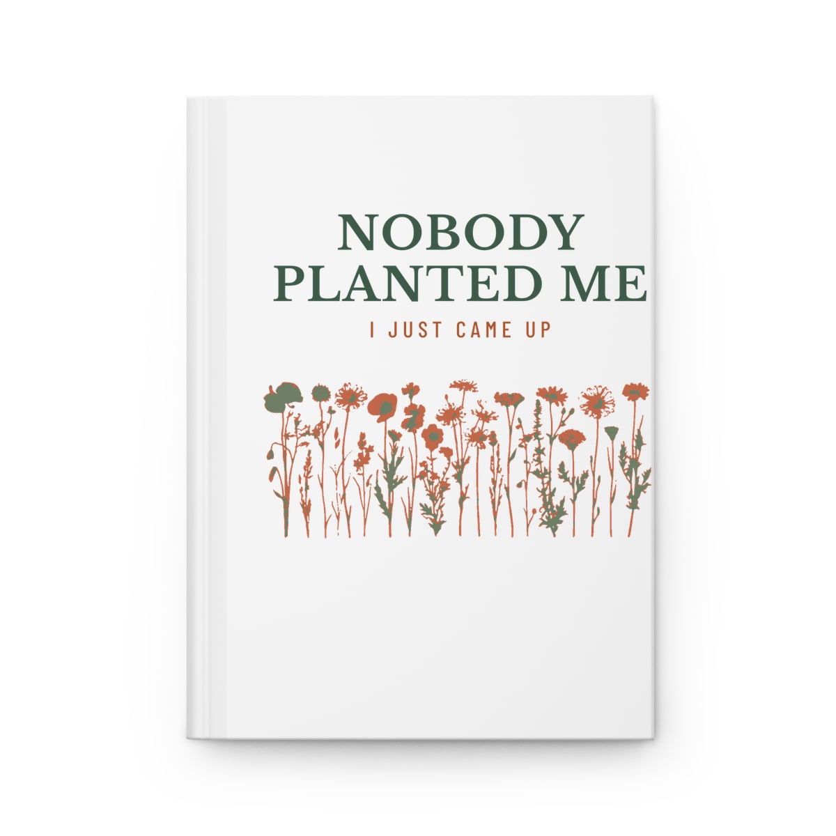 Nobody Planted Me, printed on a journal in White