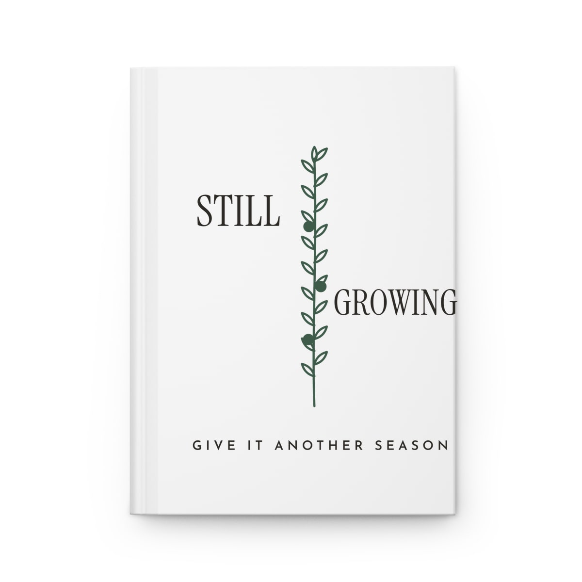 Still Growing Olive Branch, printed on a journal in White