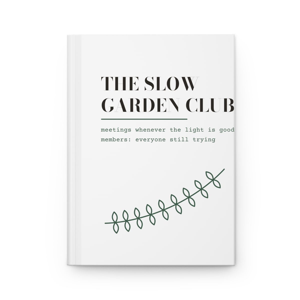 The Slow Garden Club, printed on a journal in White
