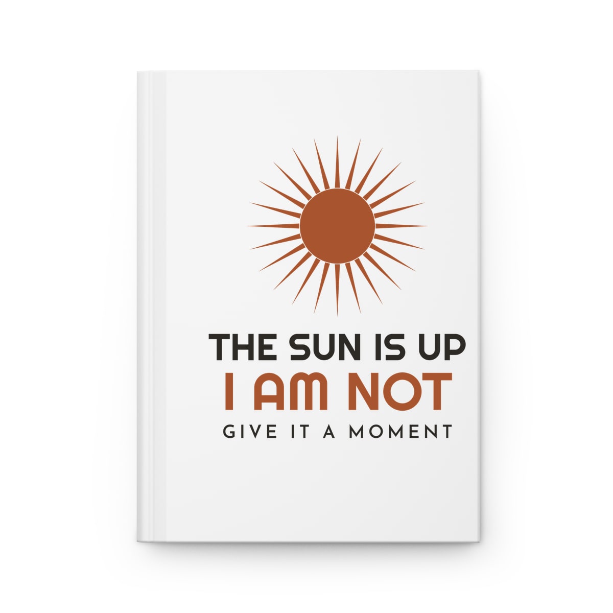 The Sun Is Up, printed on a journal in White