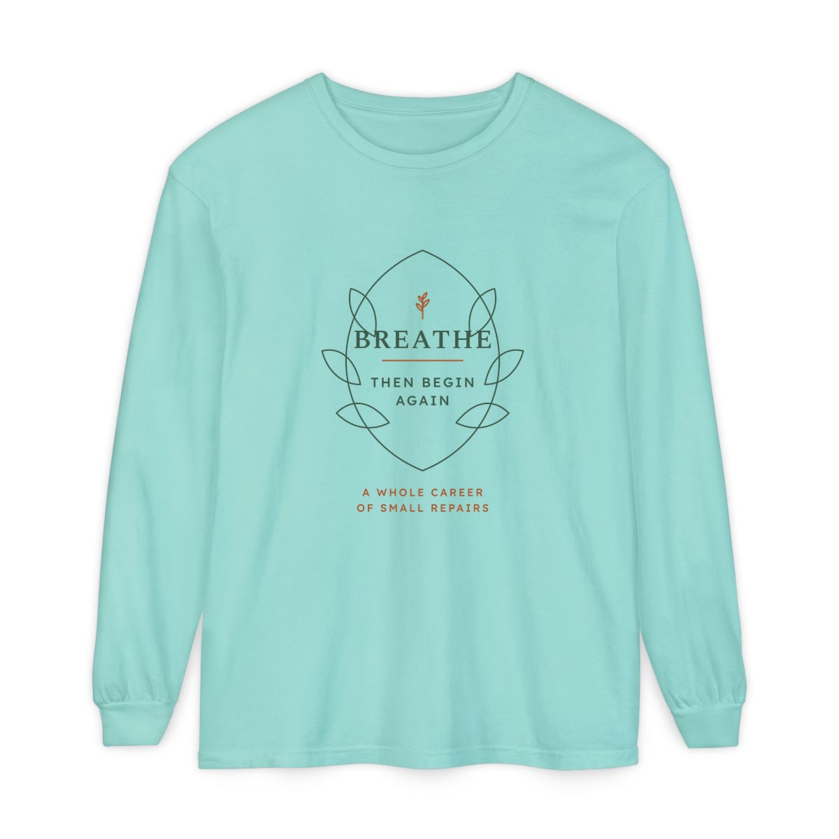 Breathe Then Begin Again, printed on a long sleeve in Chalky Mint