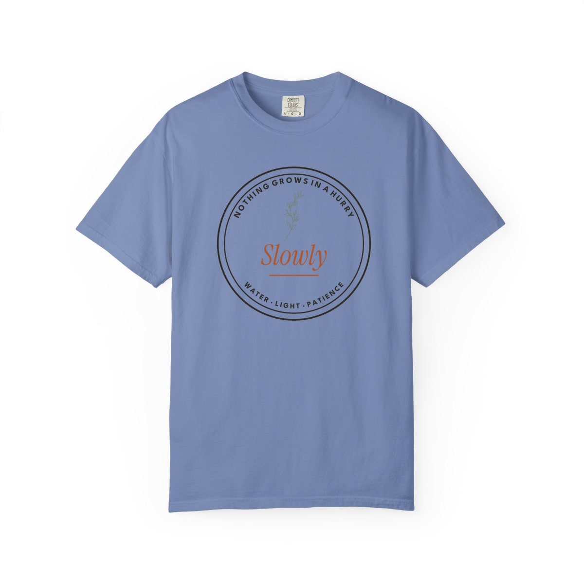 Nothing Grows In A Hurry, printed on a Comfort Colors garment-dyed t-shirt in Washed Denim