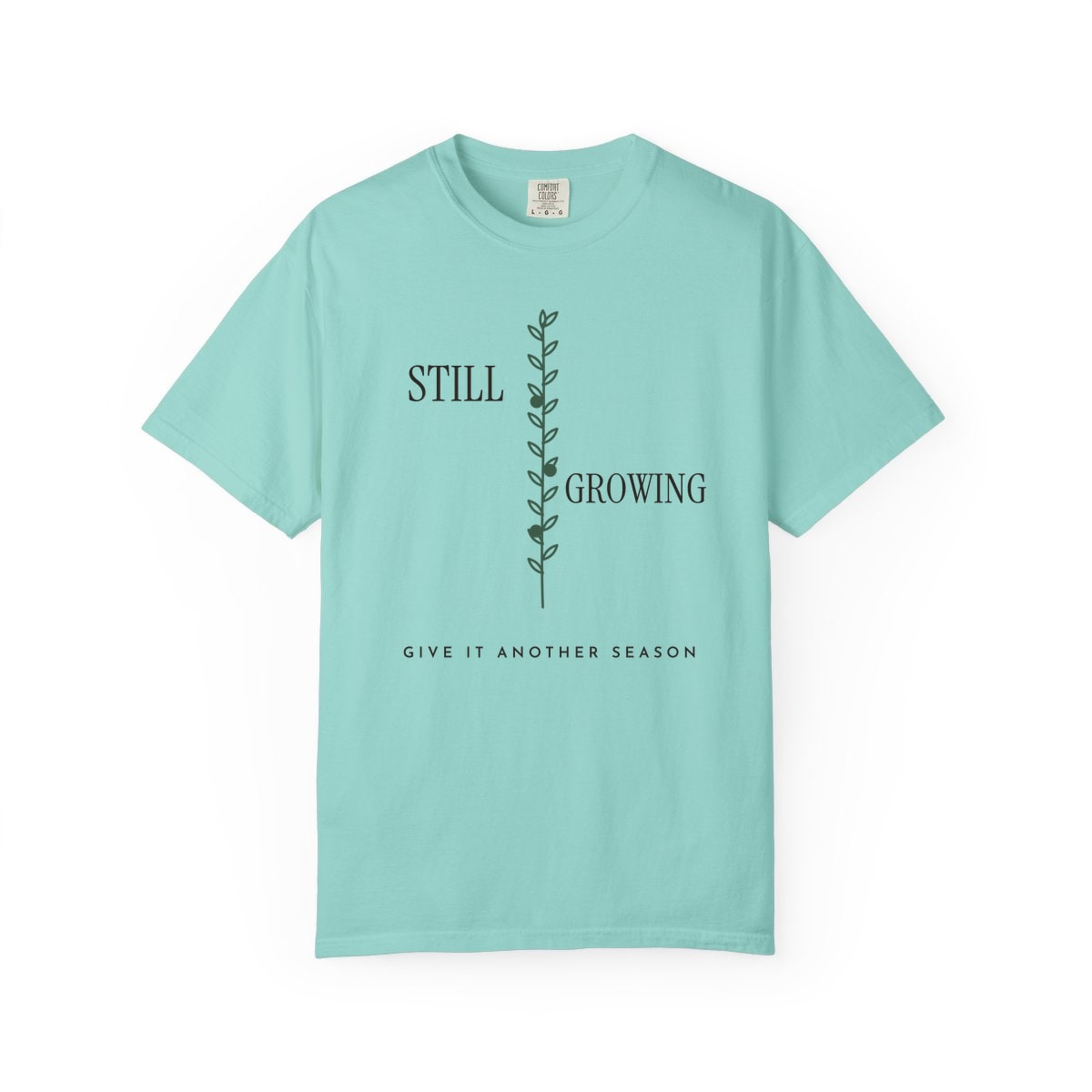 Still Growing Olive Branch, printed on a Comfort Colors garment-dyed t-shirt in Chalky Mint