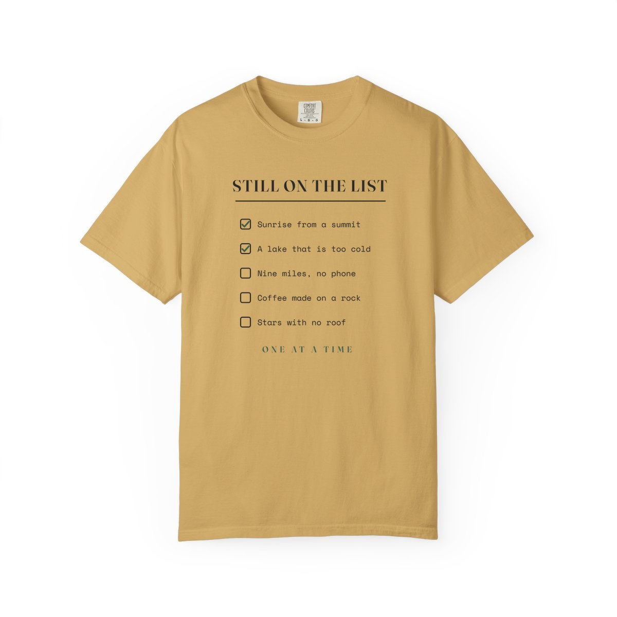 Still On The List, printed on a Comfort Colors garment-dyed t-shirt in Mustard