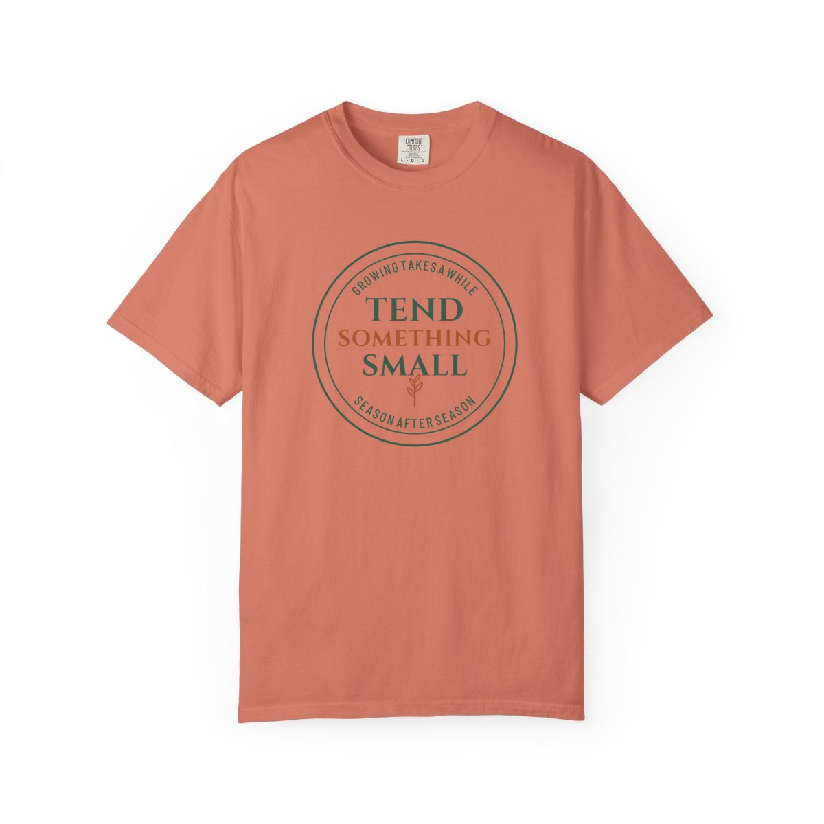 Tend Something Small, printed on a Comfort Colors garment-dyed t-shirt in Terracotta