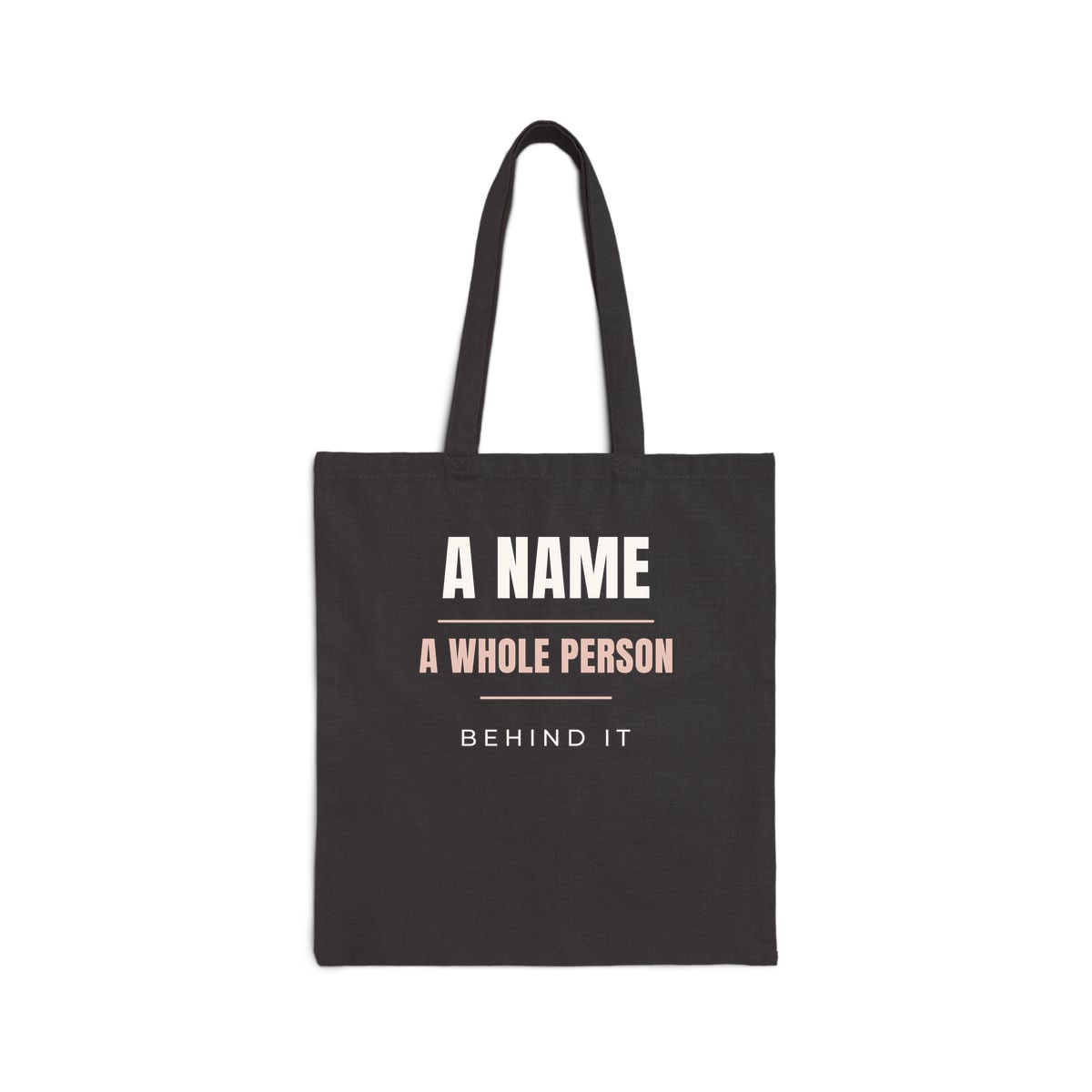 A Whole Person Behind It, printed on a tote bag in Black