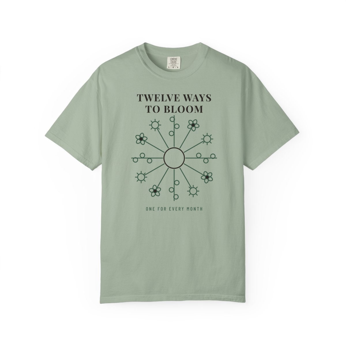 Twelve Ways To Bloom, printed on a Comfort Colors garment-dyed t-shirt in Bay