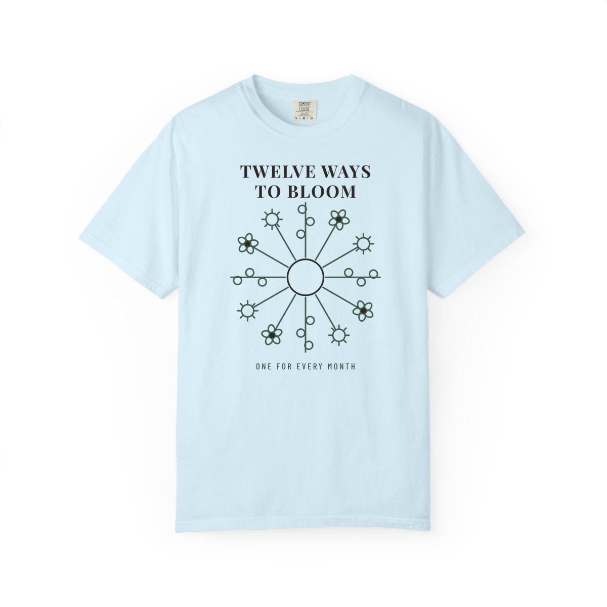 Twelve Ways To Bloom, printed on a Comfort Colors garment-dyed t-shirt in Chambray