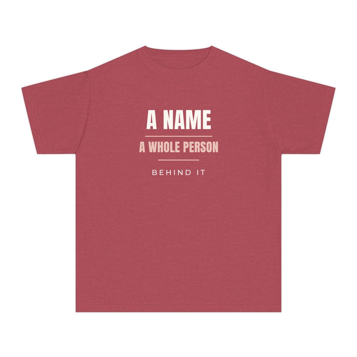 A Whole Person Behind It, printed on a youth tee in Crimson