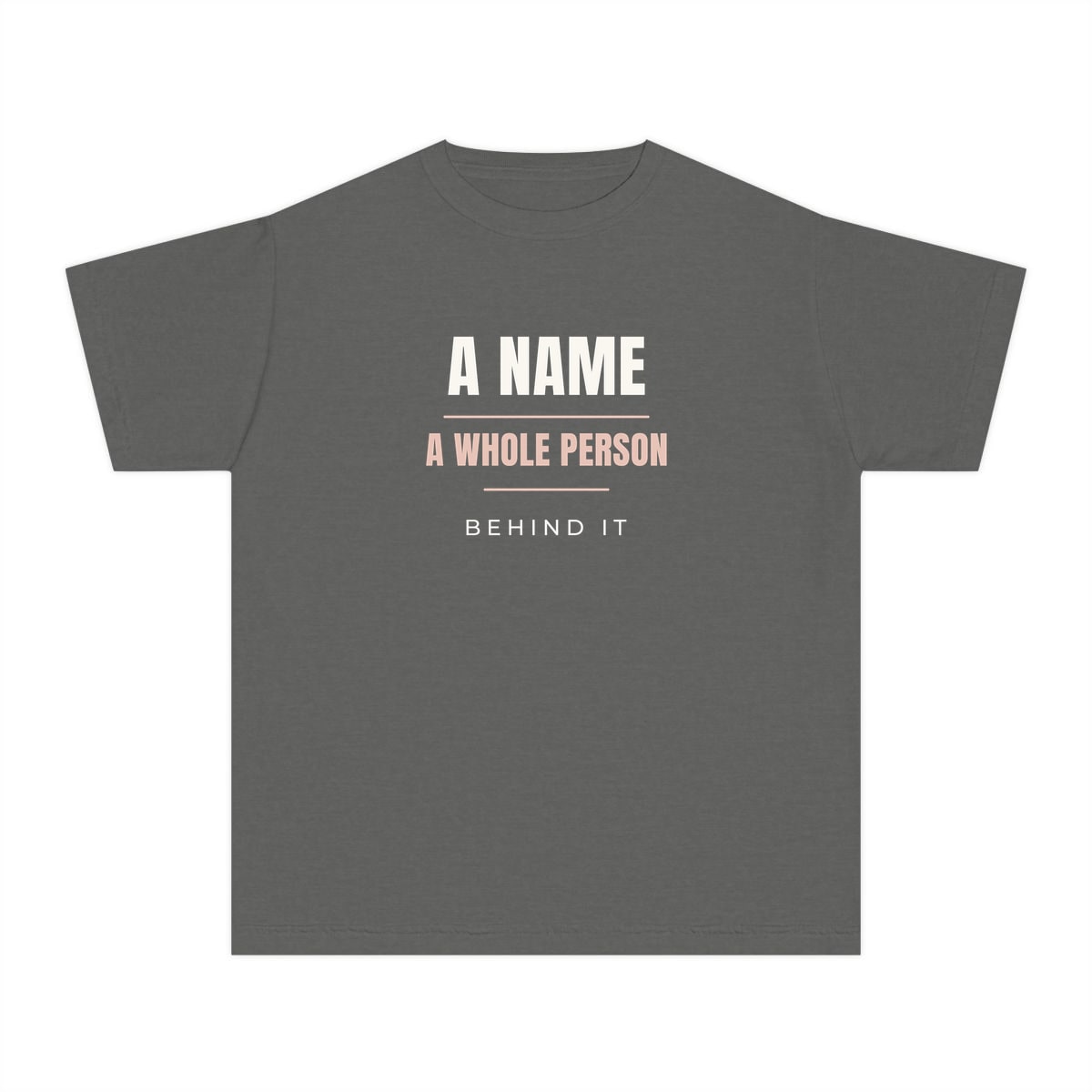 A Whole Person Behind It, printed on a youth tee in Pepper